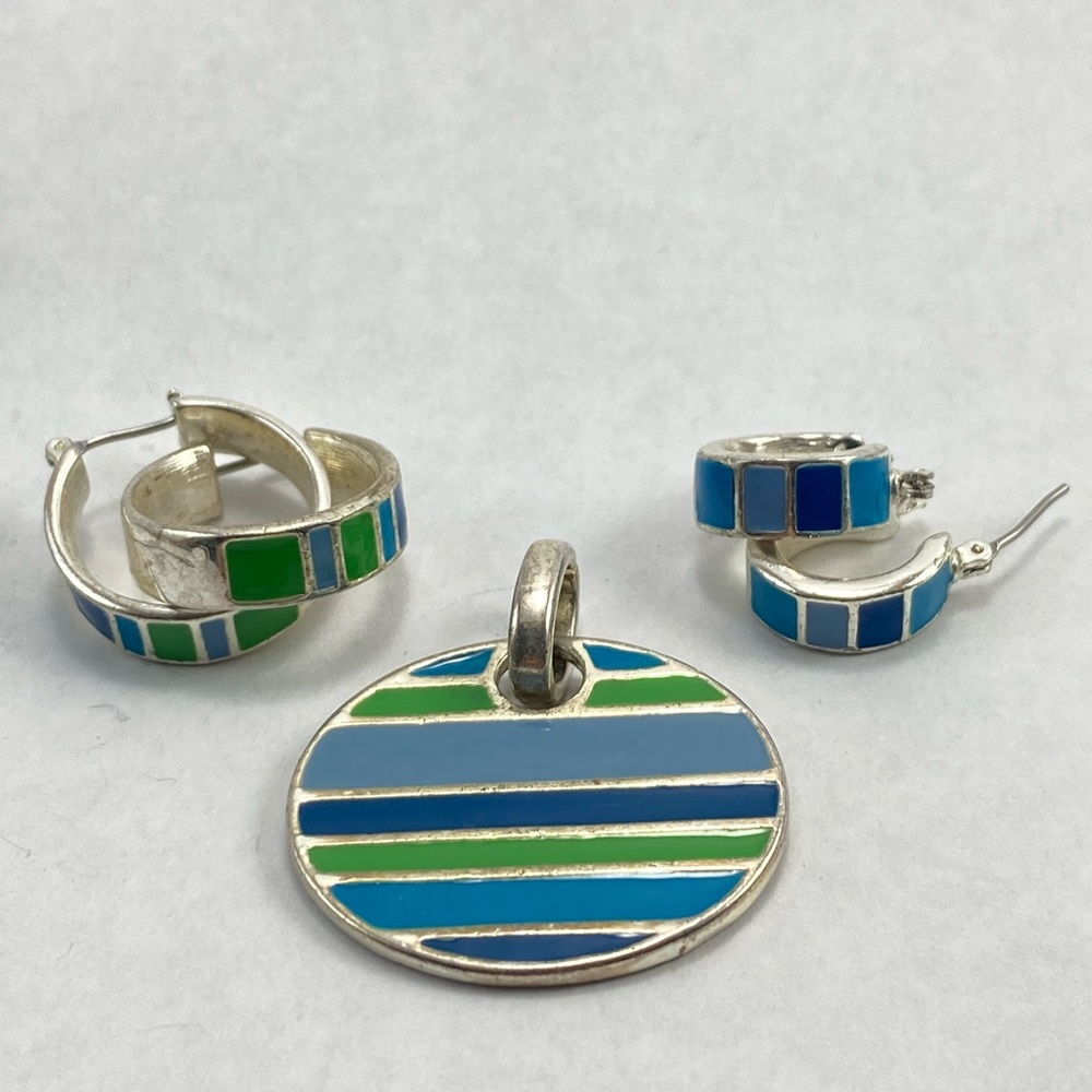 Vintage matching earrings and pendant.